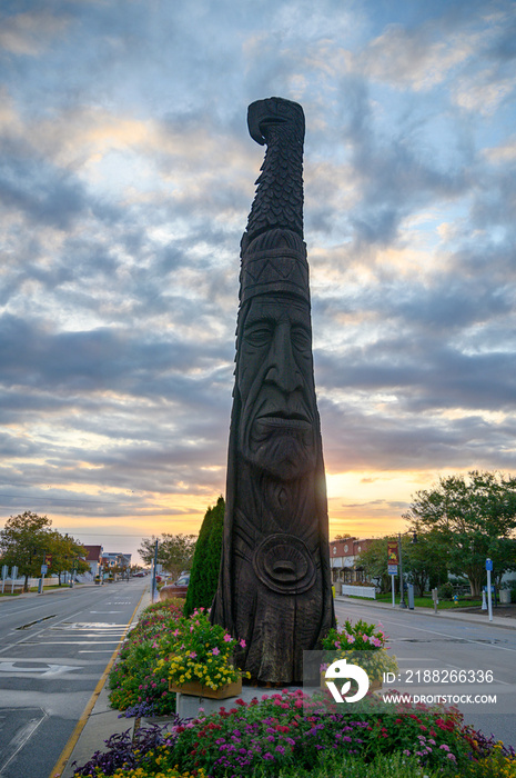 Sunrise over the totem pole at Bethany Beach.