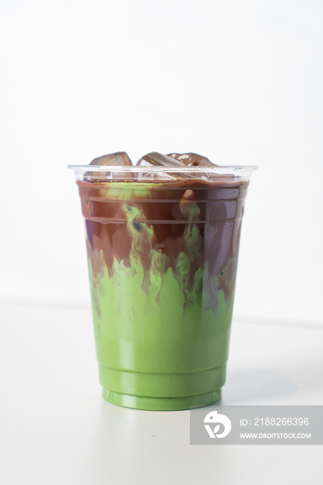 green tea matcha latte with chocolate in glass