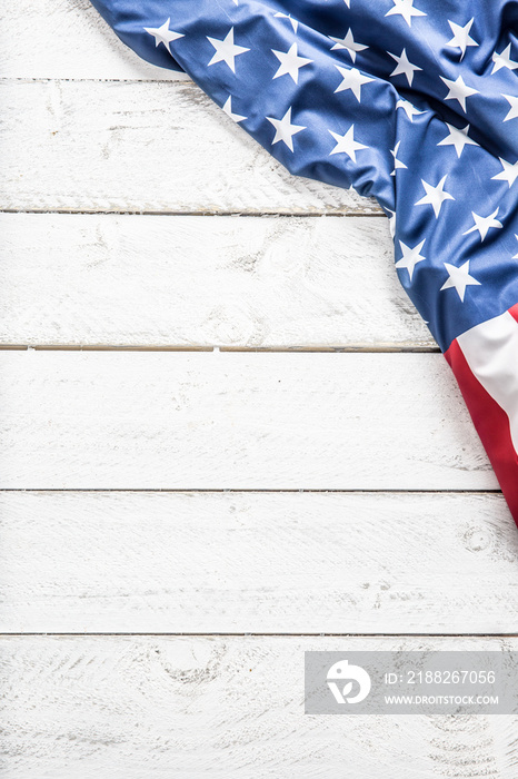 Top of view American flag on white wooden table