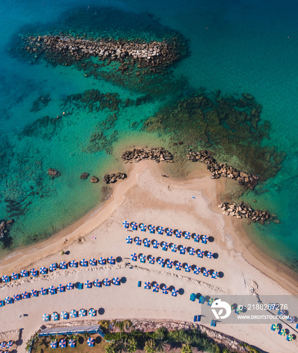 Fantastic drone shot of Laourou Beach, also known as Corallia Beach - one of the best beaches in Cyprus near Coral Bay, Paphos district, Cyprus