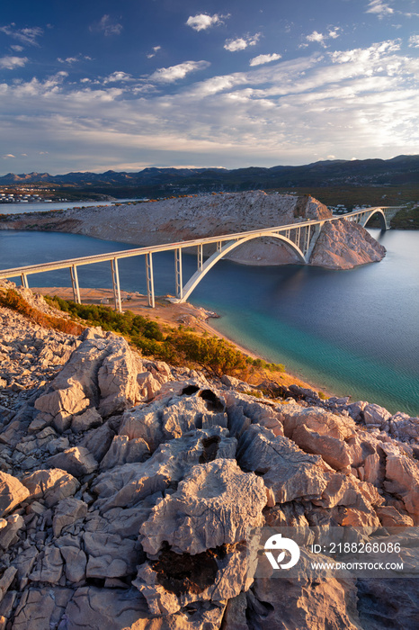 Krk Bridge, Croatia. Image of Krk Bridge which connects the Croatian island of Krk with the mainland at beautiful summer sunrise.