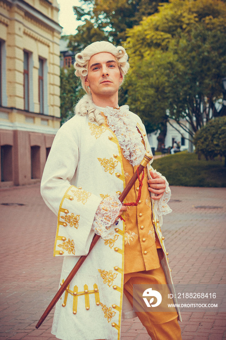 Portrait of a man in a medieval costume. Retro style and historical clothes concepts. Ukrainian Men’s fashion of the 18th century