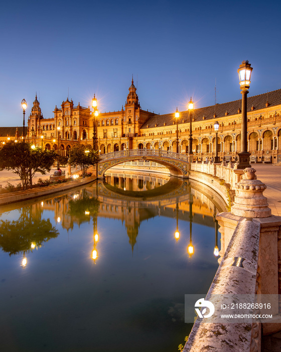 Spain Square or Plaza de Espana in Seville in the sunny summer day, Andalusia, Spain. Bridges and channel in the foreground