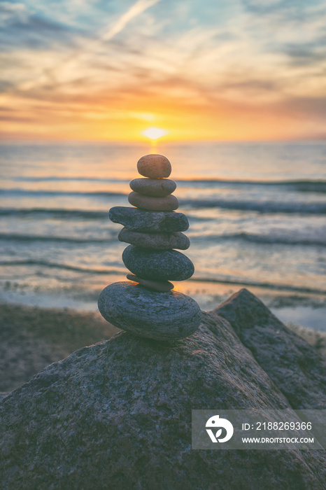 Pyramid of stones against the sunset