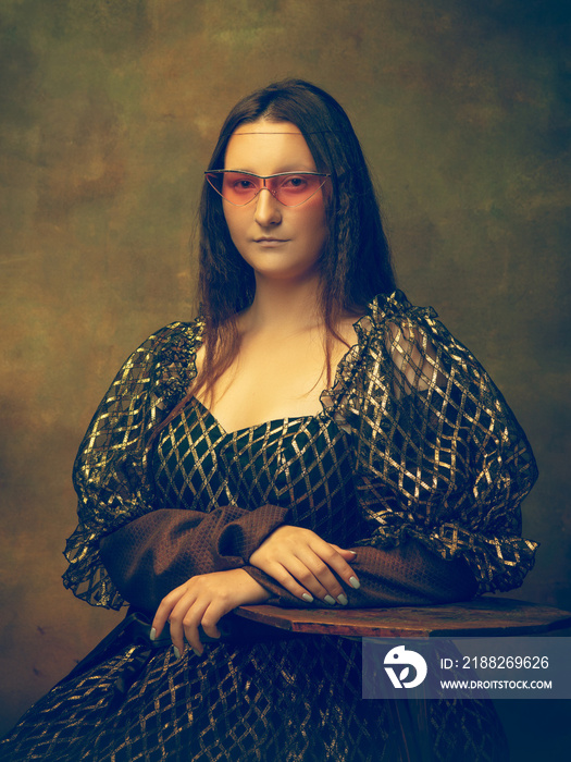 Eyewear pink. Young woman as Mona Lisa, La Gioconda isolated on dark green background. Retro style, comparison of eras concept. Beautiful female model like classic historical character, old-fashioned.