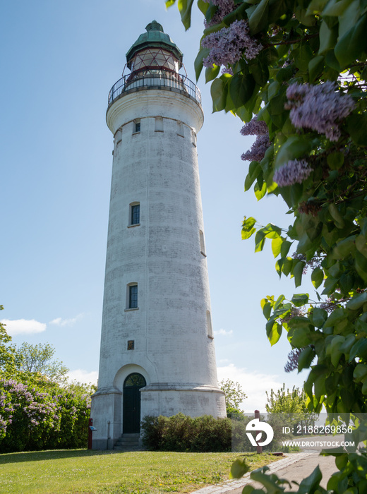 lighthouse on stevns with blue sky and clouds