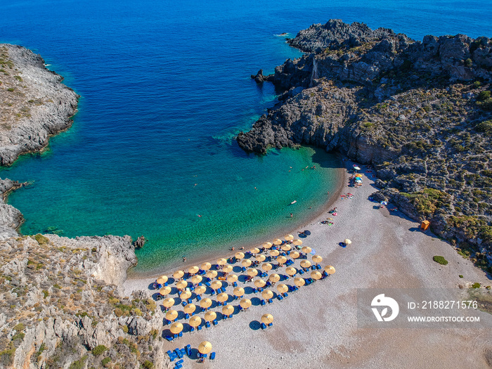 Aerial panoramic view of the famous rocky beach Chalkos in Kythira island at sunset. Amazing scenery with crystal clear water and a small rocky gulf, Mediterranean sea, Greece, Europe.