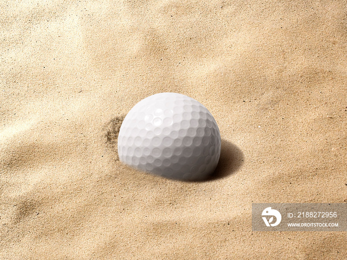 Sunlit golf ball with shadow in unraked sand trap. Macro with shallow dof