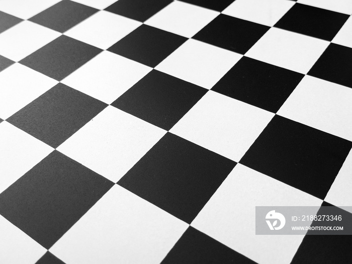 Chess board background design black and white grid.