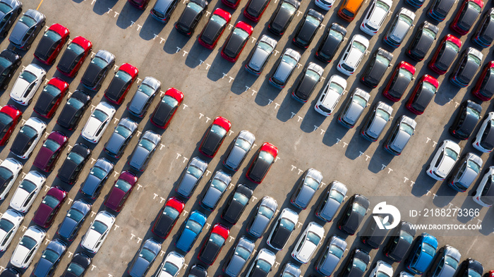 New car lined up in the port for business car import and export logistic, Aerial view new auto or automobile.
