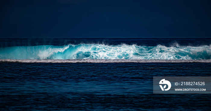 waves crashing tahiti