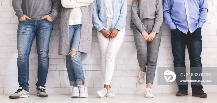 Group of people standing in row, legs or young team