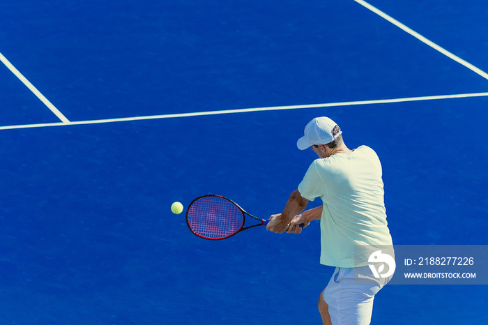 tennis player on blue court