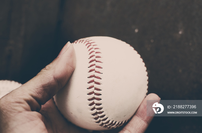 Hand held baseball with vintage look.  Batter up.