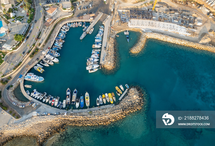 Drone aerial scenery fishing port at pernera Protaras Cyprus. Fishing boats moored in the harbour