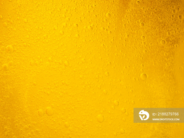 Bubbles on beer background. Oil drop shape on yellow background.Golden circle bubble water pattern.