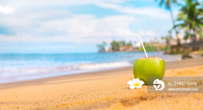 Coconut on a beach cocktail. Selective focus.