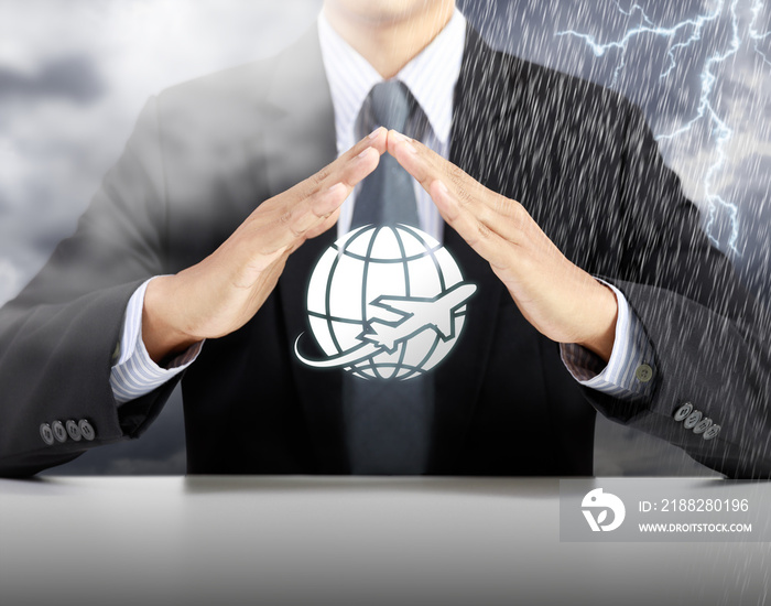 businessman hand protect plan with storm background, safety and insurance
