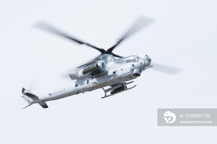 AH-1 Viper attack helicopter against the sky, with rockets and machine gun