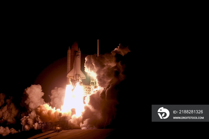 The launch of the space shuttle against the sky, fire and smoke. Elements of this image were furnished by NASA.