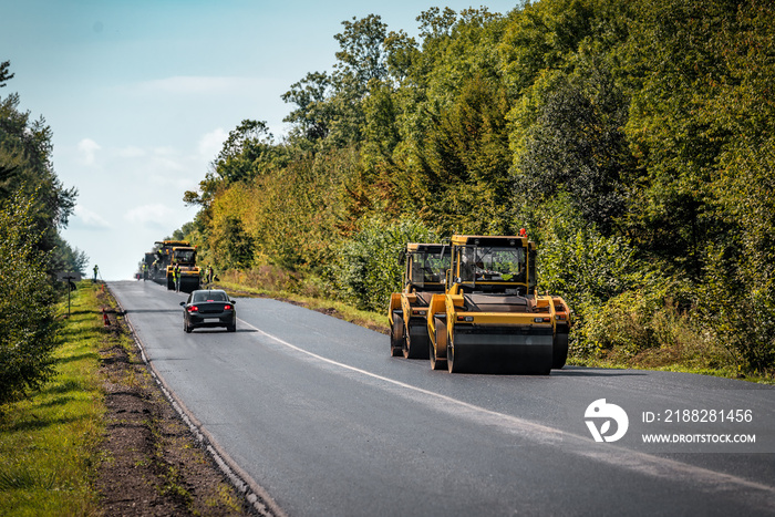 Road rollers makes new asphalt road