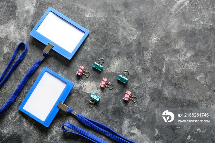 Blank badges and stationery on table