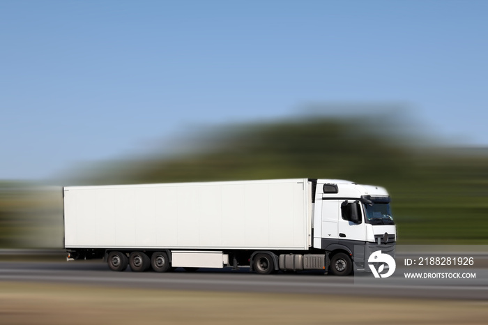 White truck runs on highway in germany at good speed!