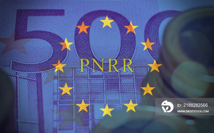 European flag with the sign  Pnrr , with Euro banknotes as background, concept of european financial help