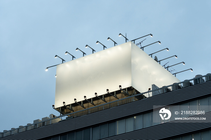 Large blank billboard on a street wall, banners with room to add your own text