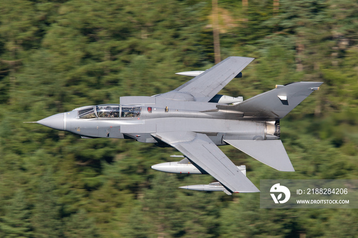 Royal Air Force Tornado jet fighter aircraft flying low level in the United Kingdom. Low flying at high speed in Cumbria, Wales and Scotland