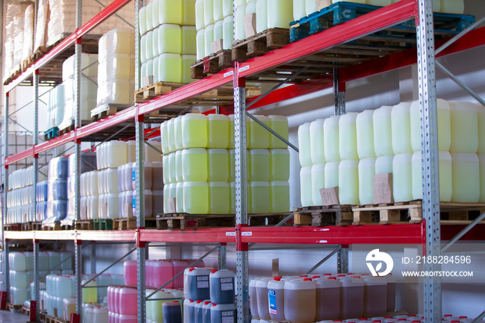 Chemical production.Warehouse with shelves, plastic cans.Warehouse with container