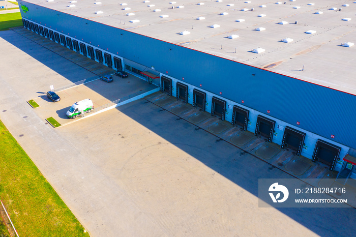 Aerial view of the distribution center, drone photography of the industrial logistic zone.