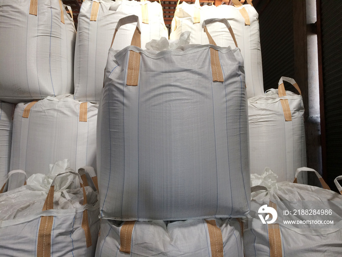 Urea fertilizer Jumbo bag stock piles in the warehouse waiting for delivery to farmers and exports.