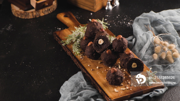 Dark chocolate truffles with hazelnuts