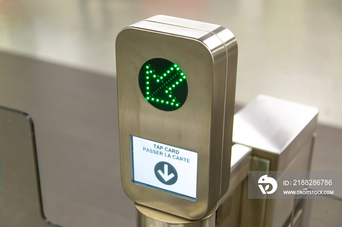 Toronto TTC Metrolinx Presto machines at a busy Bloor and Yonge station.  A contactless smart card is used to gain access to public transportation.