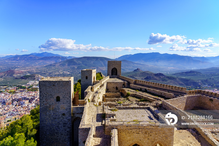 Medieval castle on top of a mountain with the city of Jaen below. Santa Catalina.