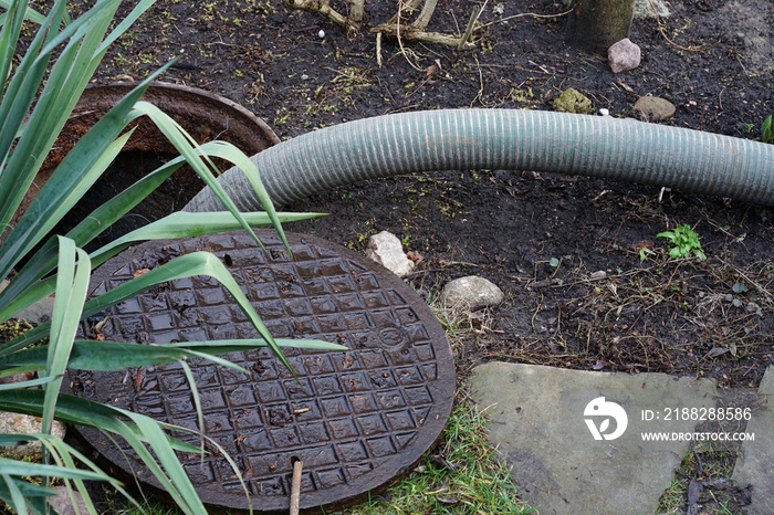 pumping septic tanks from the backyard tank in the countryside