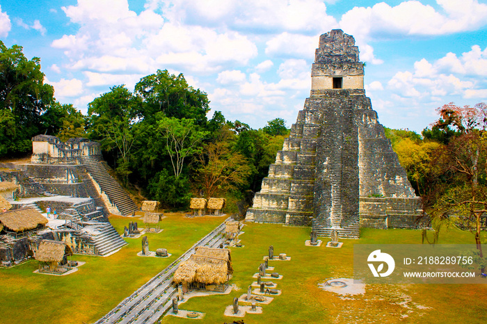 Tikal National Park on Unesco World Heritage. The Grand Plaza with the North Acropolis and Temple I (Great Jaguar Temple)