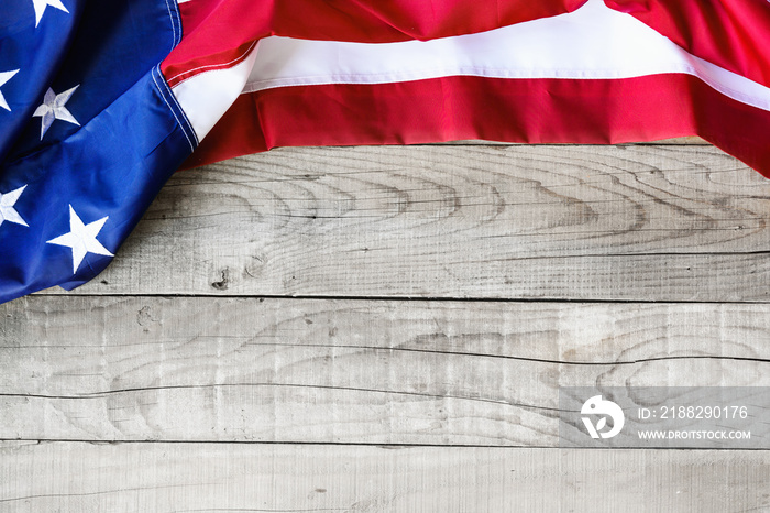 American flag over wooden background