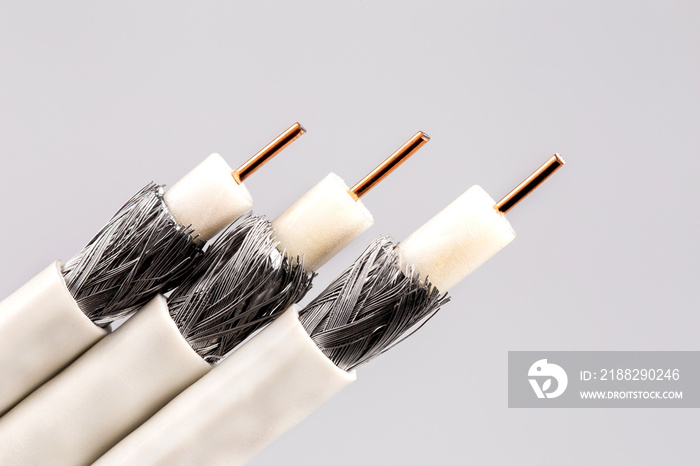 Coaxial tv cable isolated on gray background.