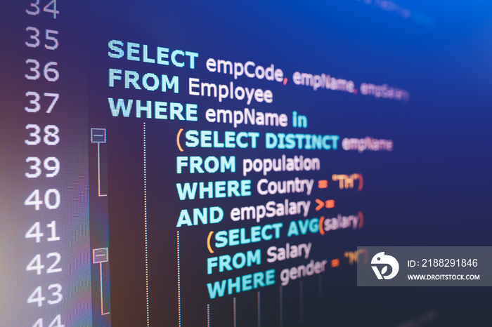 SQL (Structured Query Language) code on computer monitor. Example of SQL code to query data from a database.