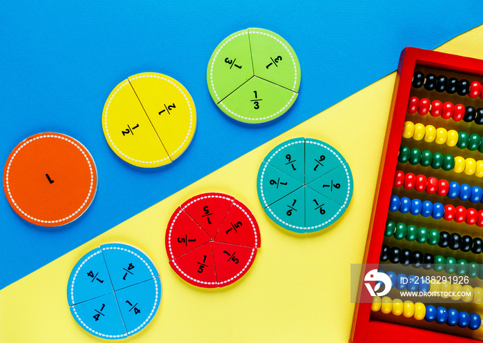 colorful math fractions on the bright backgrounds. interesting math for kids. Education, back to school concept. Geometry and mathematics materials.