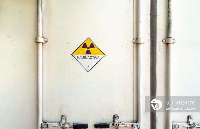 Radiation warning sign on the Dangerous goods transport label Class 7 at the container of transport truck