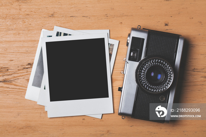 vintage retro camera with a blank instant photograph frame