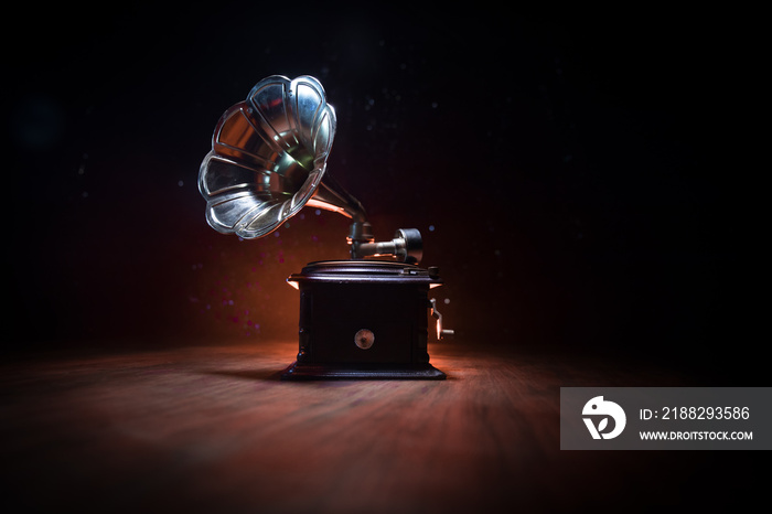 Old gramophone on a dark background. Music concept