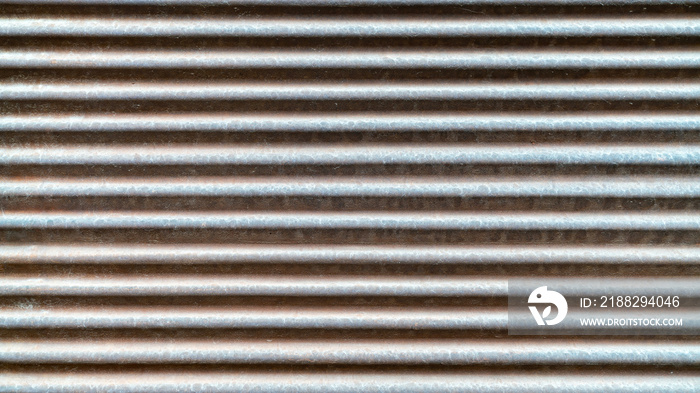 Gray metal shutters, real galvanized sheet metal texture, with deformations in the metal shutter surface