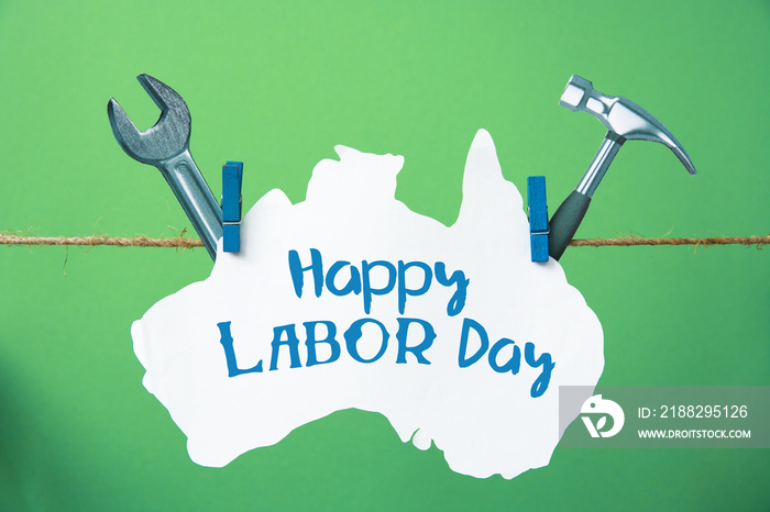 happy Labor day Australia card. 1 May Workers Day Australian  flag, Hammer and wrench - grunge abstract image