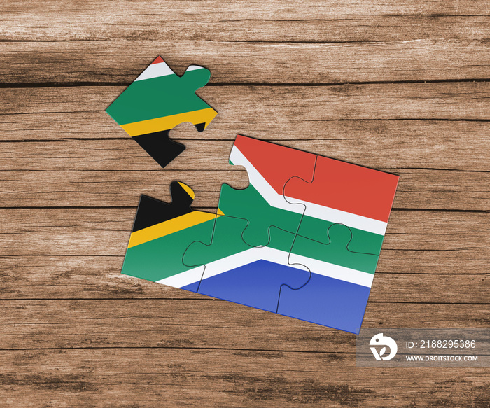 South Africa national flag on jigsaw puzzle. One piece is missing. Danger concept.