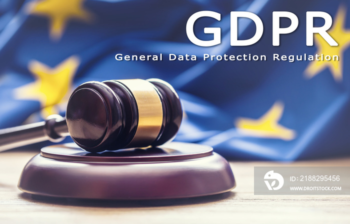 Judges wooden gavel with EU flag in the background with text GDPR- General Data Protection Regulation