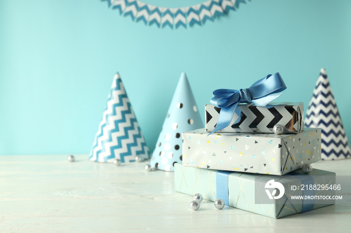 Birthday accessories on white wooden table, space for text